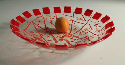 Fused glass bowl with reds (apricot, not glass)