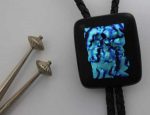 Bolo tie, turquoise dichroic on black, silver tips, by Diane C. Taylor