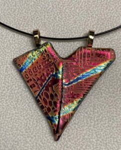 Almost-Art Deco Heart, dichroic glass, comes with 16" or 18" magnetic neck wire, $50