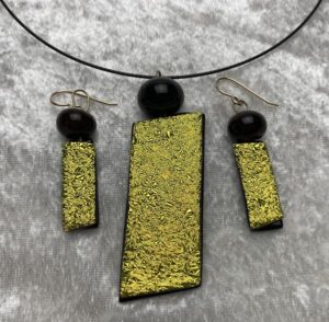 Gold dichroic pendant & earrings with black bead