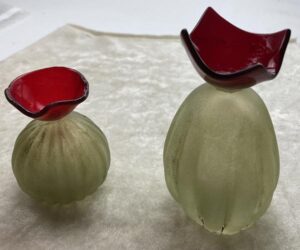 Blown cacti, clear, sandblasted and colored with oil paint, topped with a fused flower.